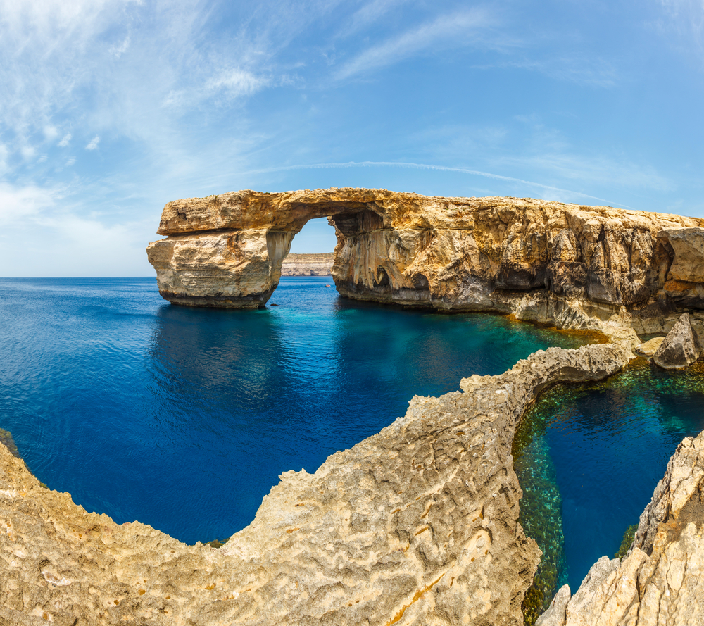 Azure Window famous stone arch of Gozo island in the sun in summer Malta 