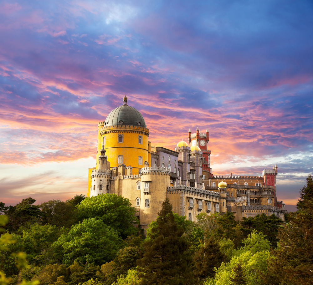 Fairy Palace against sunset sky  Panorama of Pena National Palace in Sintra Portugal  Europe