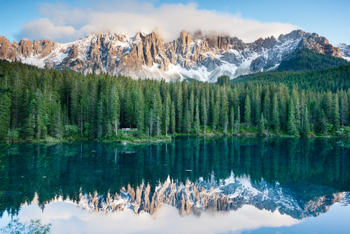 Karersee Lago di Carezza is a lake in the Dolomites in South Tyrol Italy