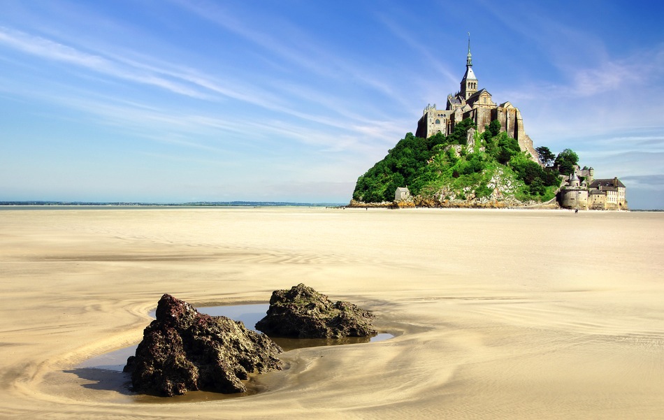 Mont Saint Michel with boulders in the foreground
