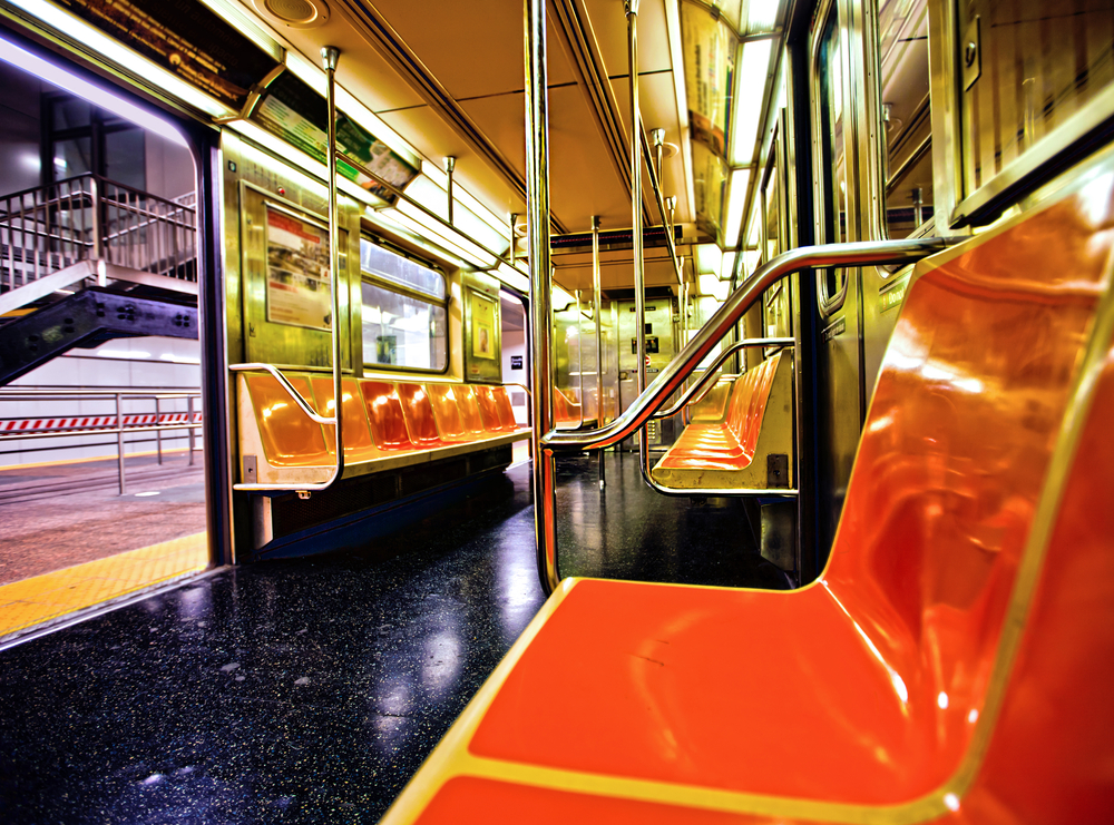 New York subway car interior with open door