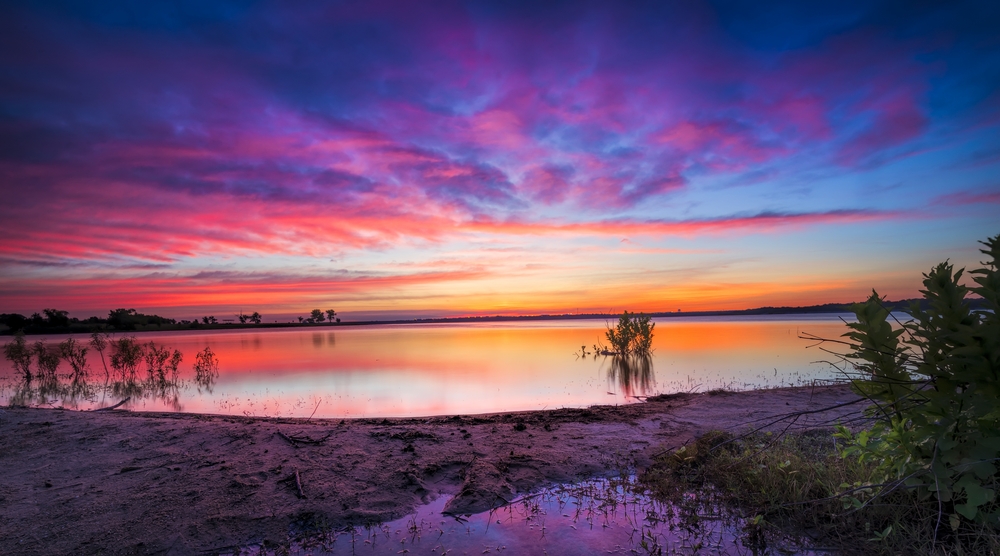 Vivid Texas sunrise over Benbrook Lake 
