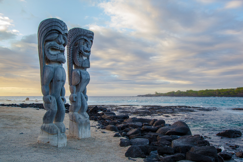 Wooden Hawaiian statues in Puauhonua o Honaunau National Historical Park Big Island Hawaii 