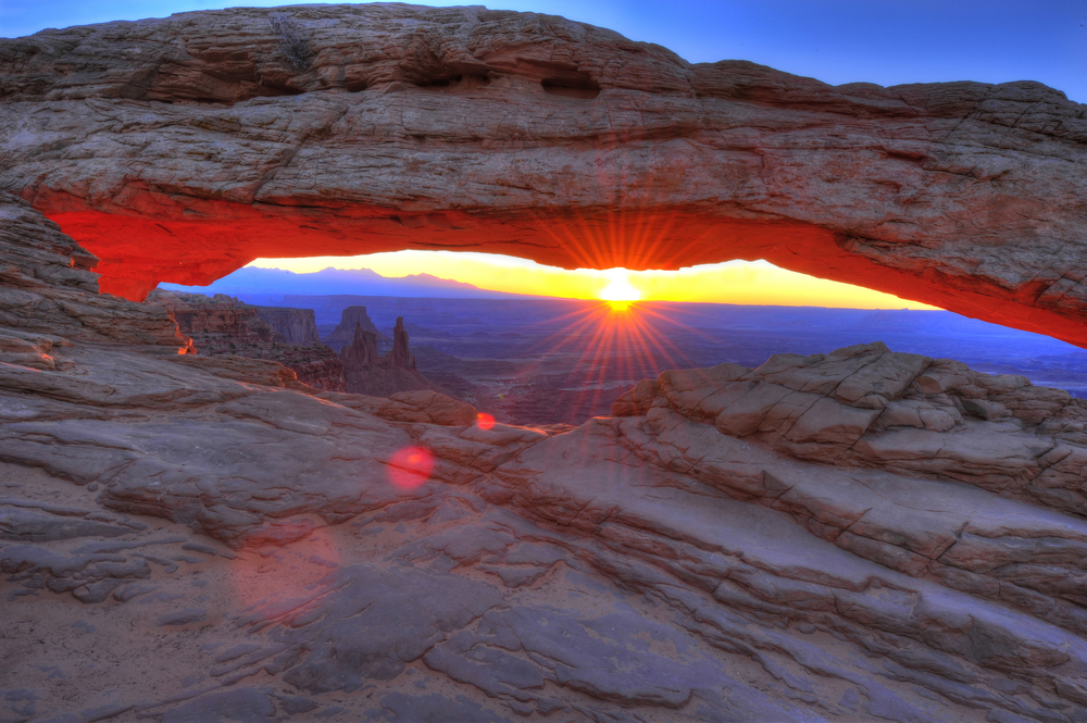 amazing colors of sunrise on Mesa Arch in Canyonlands National park Moab Utah